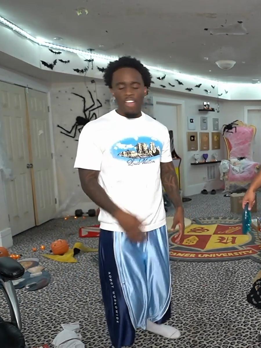 Kai Cenat on stream in the Obsidian Blue Worldwide Polyester Jorts