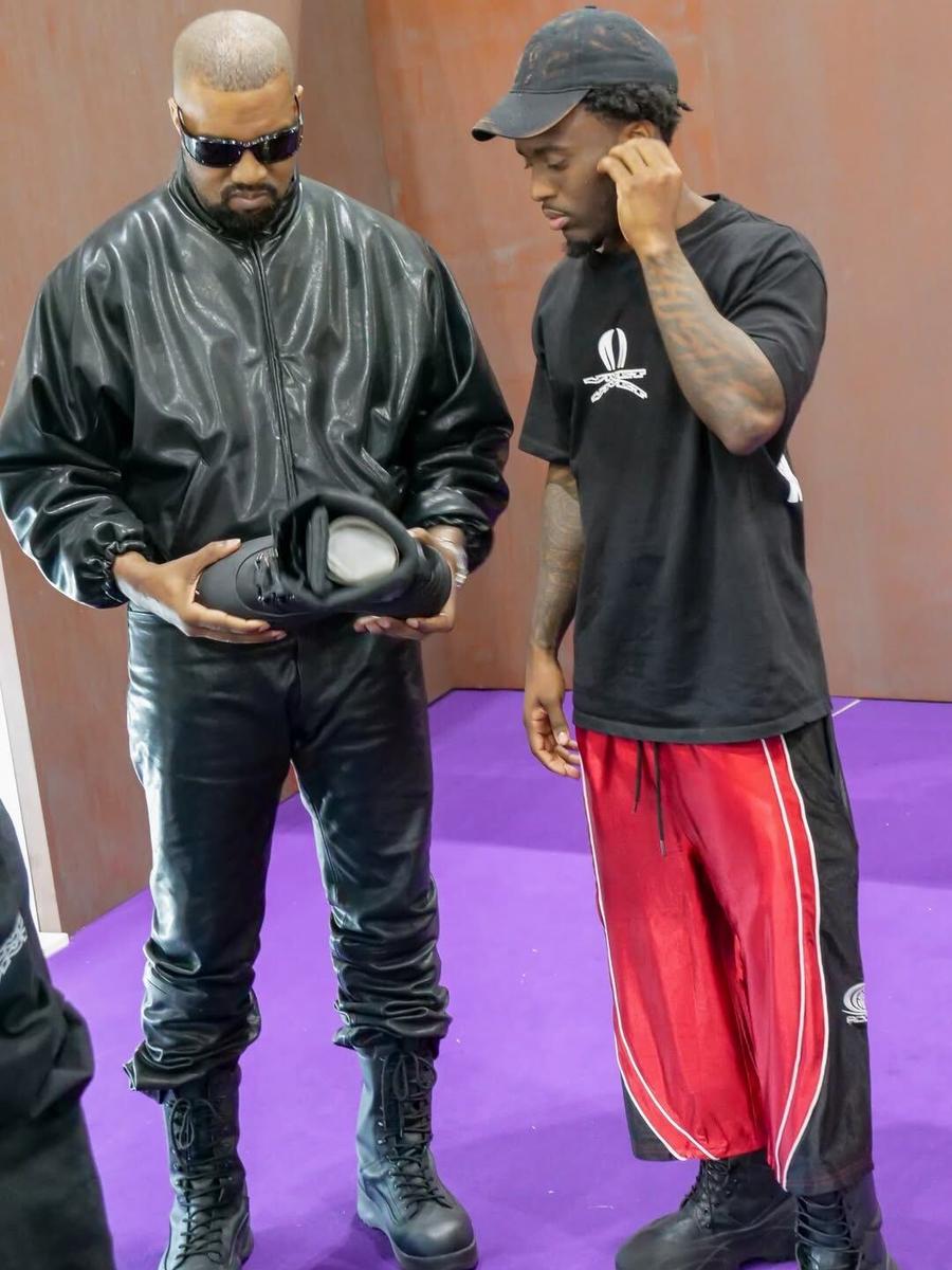 Kai Cenat with Ye in the Black Red Worldwide Polyester Jorts